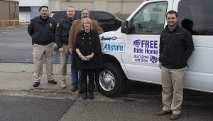 Jodi Marze| Picayune Item Group effort:  From left are Deputy Chief Chad Dorn and Chief Bryan Dawsey of the Picayune Police Department, John Pigott of Pigott Allstate Insurance, Tina Stockstill, Chamber President and Mark Herring of Herring Ford.