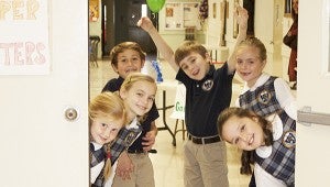 Jodi Marze | Picayune Item WELCOME! : Students from Mrs. Monfra’s class greeted, escorted, served and waited tables while their guests enjoyed their manners and bright smiles. From left — 3rd grade students: Amy Pigott, Lauren Gobuzzi,  Ayden Babb, Aidan Peckenpaugh, Brianna Barousse and Lourdes Valverde welcomed community volunteers to their third annual “Souper” Community Helper Luncheon which was held in the school lunchroom.  