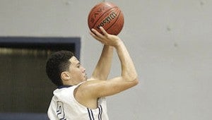 ALL-AMERICAN: Moss Point’s Devin Booker was recently selected to play in the prestigious McDonald’s All-American game. Booker and the Tigers host Poplarville Friday night. Photo by Mike Kittrell of Mississippi Press