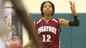 BIG SHOT: Picayune’s Jada Simmons hit a big 3-pointer in double overtime to pace the Lady Tide to a win over Stone County Tuesday night. Photo by James Pugh