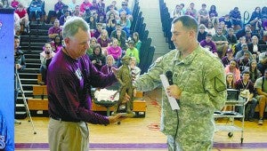AWARD WINNERS: Picayune Memorial High School Head Football Coach Dodd Lee, left was presented with the National Guard national ranking trophy during the MaxPreps Football Tour of Champions Friday.  Photo by Jeremy Pittari 