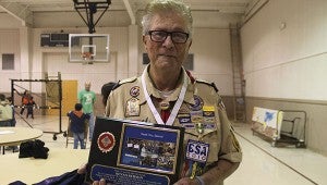 Years of dedication: Dennis Redman was awarded a plaque of appreciation for his 65 years of dedication to the Boy Scouts of America and Troop 2 in Picayune.  Jodi Marze | Picayune Item
