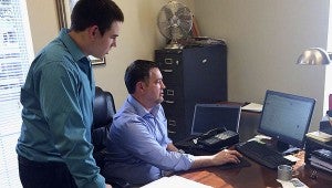 In his shadow: Poplarville High School senior Michael O'Bryant has spent three days shadowing Poplarville Mayor Brad Necaise as part of his senior project.  Photo submitted