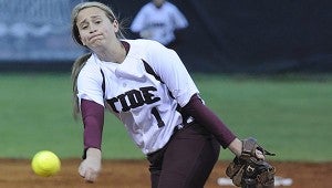 YOUNG GUN: Picayune freshman pitcher Megan Dudenhefer lets fly with a pitch in recent Lady Tide fast-pitch softball action. Picayune hosts PRC tonight. Photo by John Young
