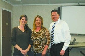 Standout parents: From left, Susie Pagander and Sabrina Orgeron were presented with Parent of the Year awards by Superintendent Alan Lumpkin at Thursday’s Pearl River County school board meeting. 
