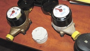 PROPOSED NEW METERS: Empire Pipe Supply brought meters for the board to physically inspect which meets the boards bid specifications for new water meters.  Jodi Marze | Picayune Item