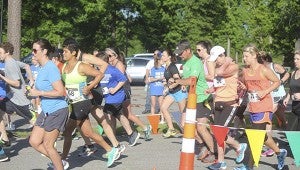 READY, SET, GO: Participants in the Blue Devil Dash 5K fundraiser take off from the starting line.  Photo submitted