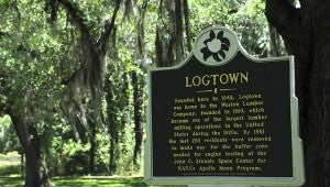 NO LONGER: Logtown and the village of Possum Walk no longer exsist, but the Stennis Space Center honors the former towns with markers along their nature tails at the Infinity Sciene Center in Hancock County.  Photo by Alexandra Hedrick 
