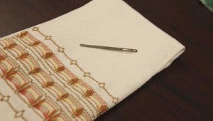 NEEDLE AND THREAD: A bodkin needle is shown with another one of Edie’s creations.  Jodi Marze | Picayune Item