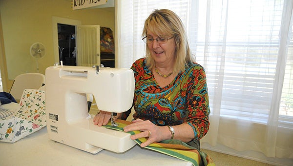 Sewing up a good time: Seniors practice sewing skills - Picayune Item ...